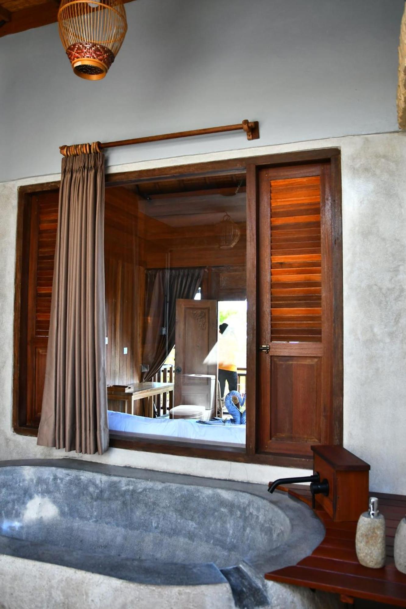 Putra'Lebah Amed Guest House Exterior photo